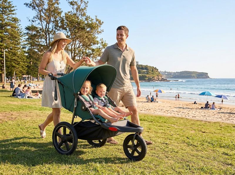 Parent jogging uphill with a three-wheel jogging stroller